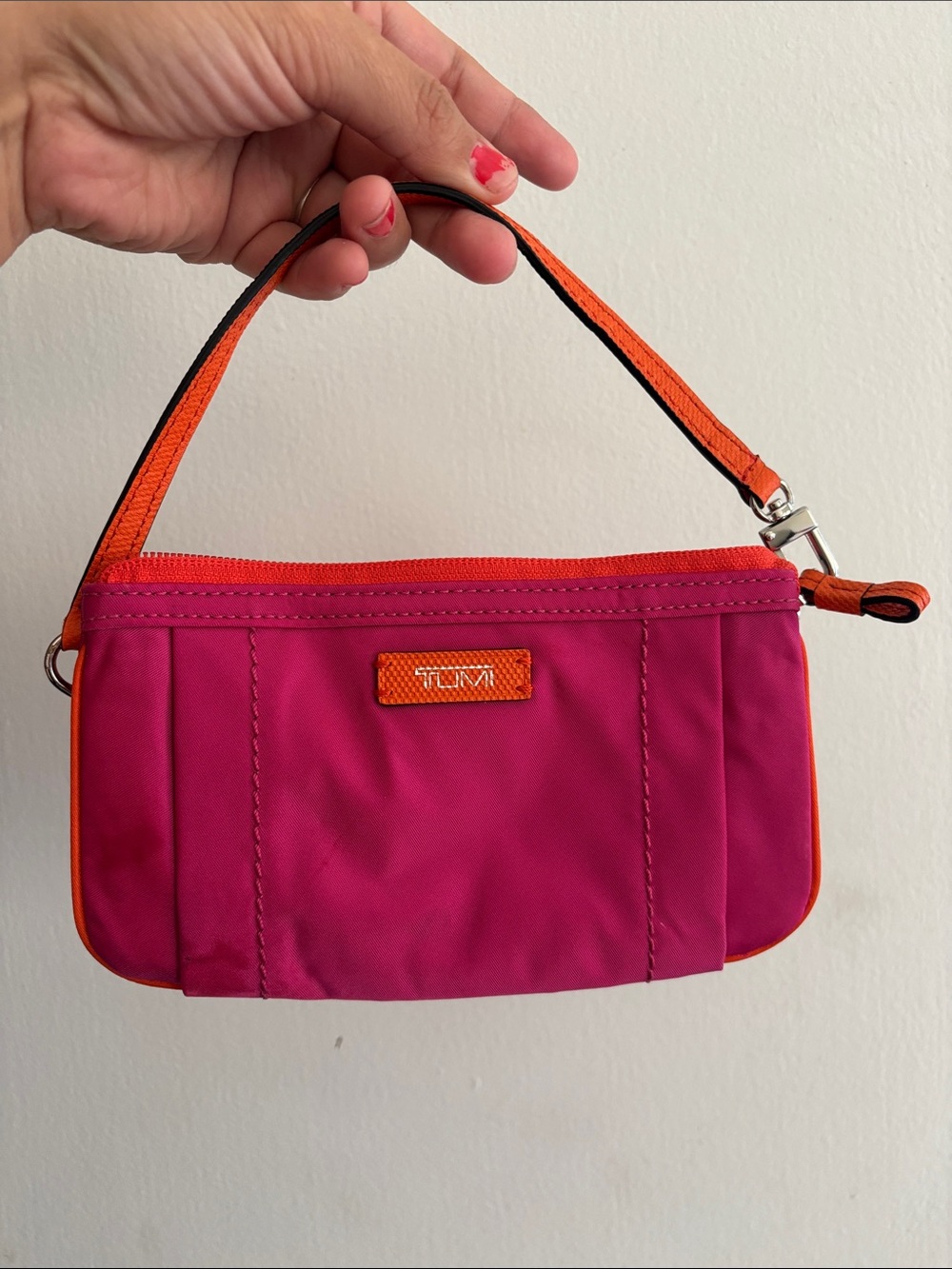 Tumi Pink Wristlet with Orange Trim